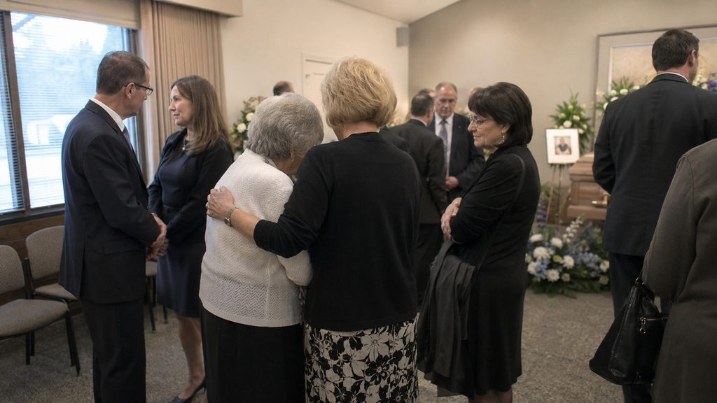 Family and friends gathering for a viewing before a Latter-day Saint funeral